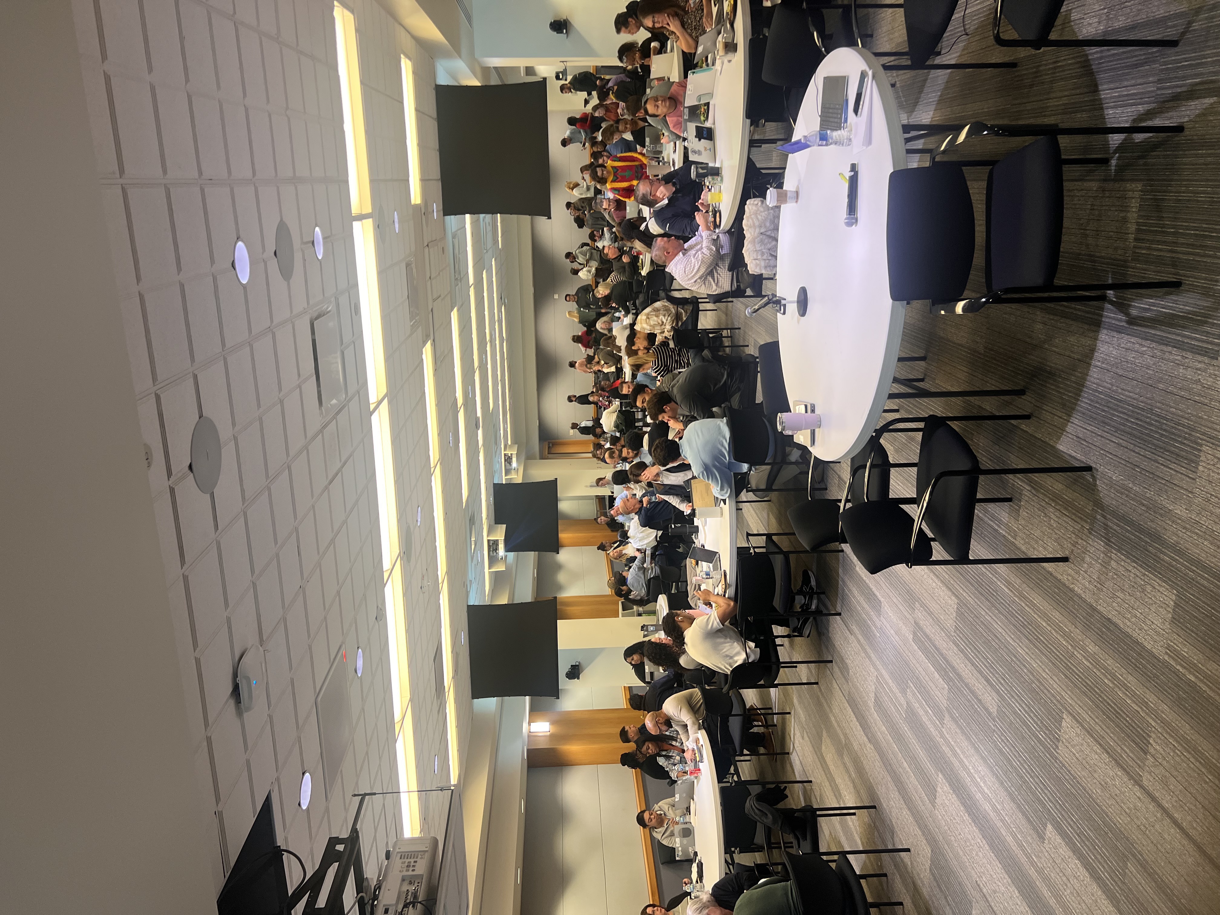 VSG AI training workshop — professionals learning AI in a conference setting
